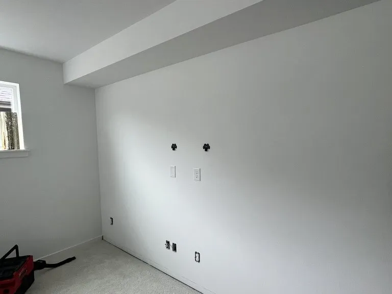 The room prepped and stripped back before the fireplace wall went in