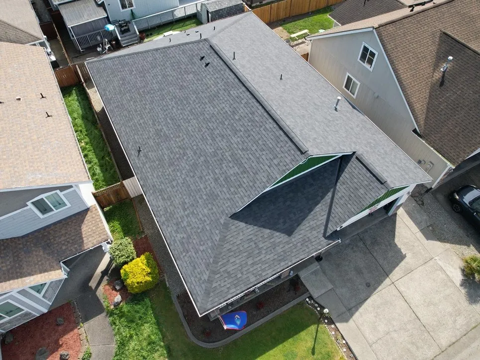 A finished shingle roof with a dormer, seen from above