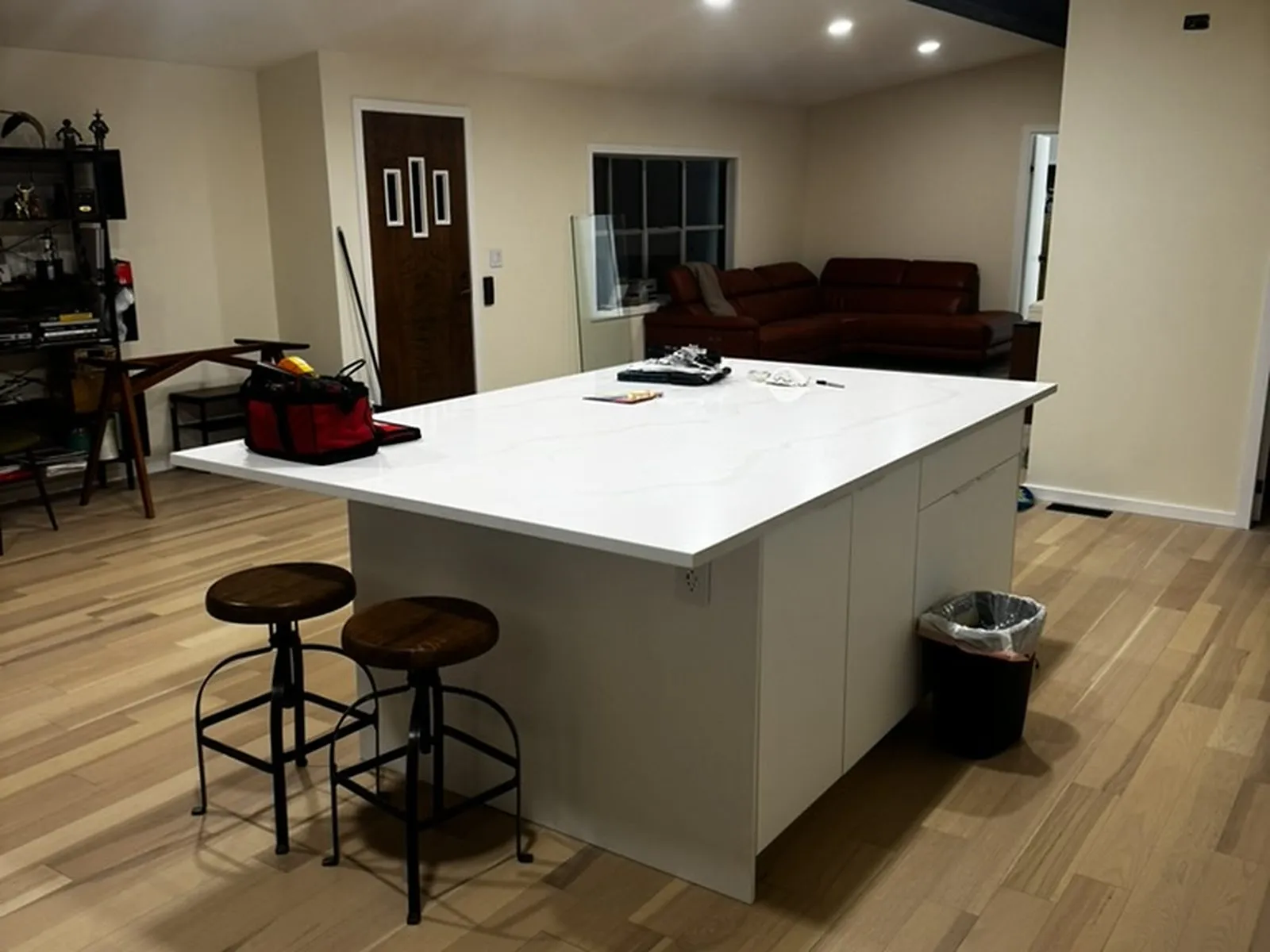 The finished open living area looking through to the kitchen island