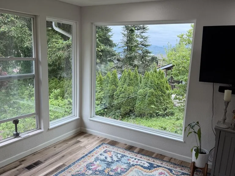 A living room with new windows on two walls