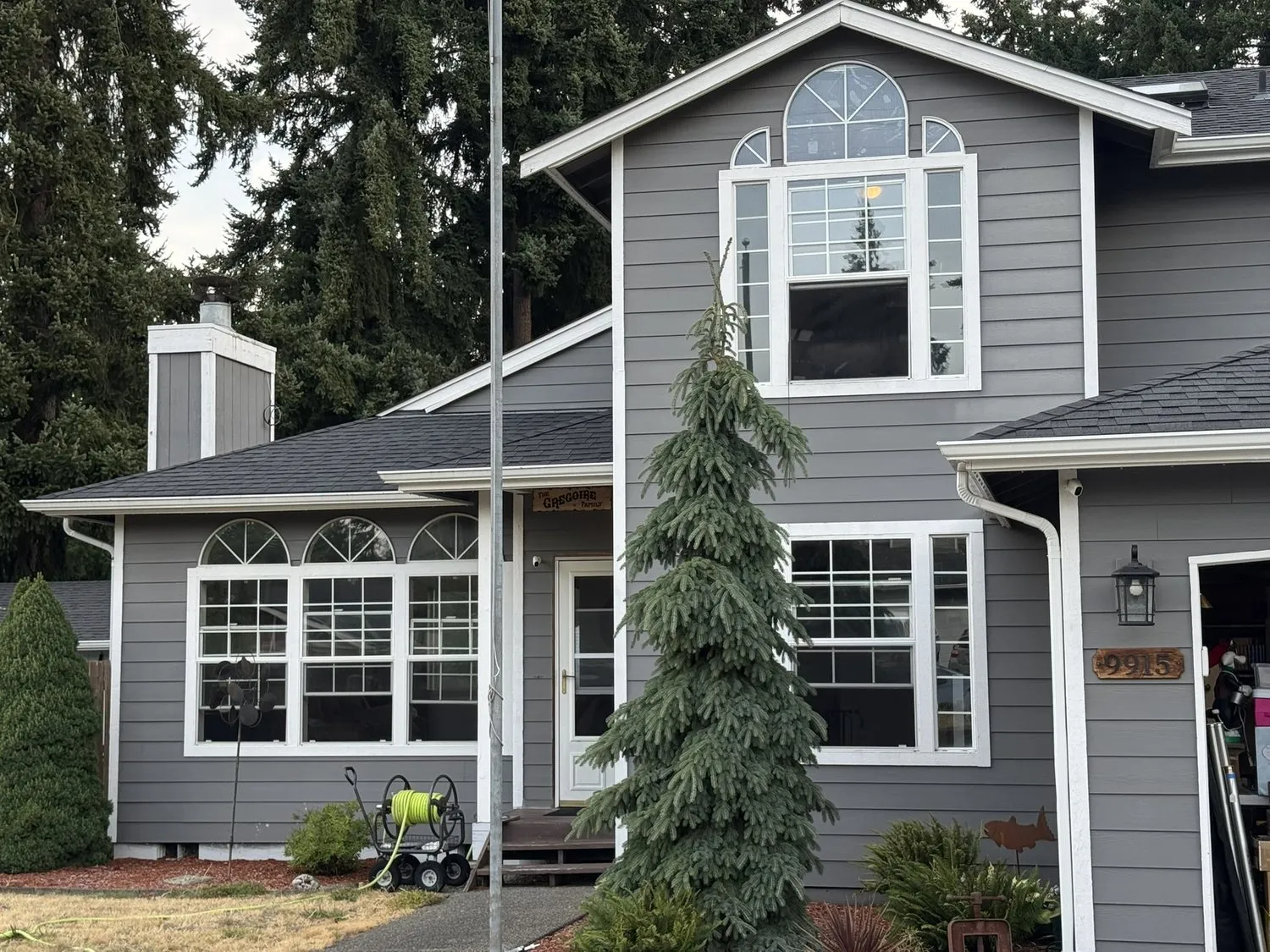 A home exterior after a full window replacement